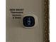 This property boasts a modern smart thermostat, installed both upstairs and downstairs for optimal climate control at 153 Via Di Mello, Henderson, NV 89011