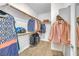 Bright walk-in closet featuring rod and shelf, maximizing storage and organization at 153 Via Di Mello, Henderson, NV 89011