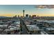 Striking aerial shot of the cityscape, capturing its vibrant skyline during sunset at 1601 Eaton Dr, Las Vegas, NV 89102