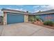 Daytime shot of home exterior with two car garage at 1601 Eaton Dr, Las Vegas, NV 89102