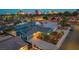 Aerial night view of the home with desert landscaping and solar panels in Las Vegas at 1601 Eaton Dr, Las Vegas, NV 89102