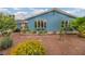 Home exterior features a well-maintained front yard with desert landscaping and bay window at 1601 Eaton Dr, Las Vegas, NV 89102