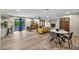 Large living area with dining, kitchen access and sliding doors to a refreshing backyard pool at 1601 Eaton Dr, Las Vegas, NV 89102