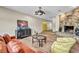 Cozy living room with stone fireplace, hardwood floors, and stylish furnishings at 1601 Eaton Dr, Las Vegas, NV 89102