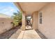 Outdoor living is easy on this covered back patio with desert landscaping at 199 Bailey Island Dr, Henderson, NV 89074