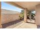 This back patio is great for enjoying the outdoors and desert landscaping at 199 Bailey Island Dr, Henderson, NV 89074