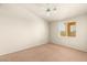 This bedroom features carpet, neutral paint, and a window to let in natural light at 199 Bailey Island Dr, Henderson, NV 89074