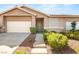 Charming single-story home with a two-car garage and neatly landscaped front yard at 199 Bailey Island Dr, Henderson, NV 89074