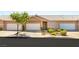 Charming single-story home featuring a two-car garage and well-maintained landscaping at 199 Bailey Island Dr, Henderson, NV 89074