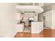 Modern kitchen with stainless steel appliances, light wood cabinetry, and open layout to living space for easy entertaining at 199 Bailey Island Dr, Henderson, NV 89074