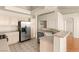 Bright kitchen features stainless steel appliances, light wood cabinets, and an open layout for seamless entertaining at 199 Bailey Island Dr, Henderson, NV 89074
