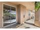 The patio is covered and includes a sliding glass door for easy inside-outside access at 199 Bailey Island Dr, Henderson, NV 89074