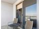 Cozy balcony with seating, offering scenic city views at 200 W Sahara Ave # 1703, Las Vegas, NV 89102