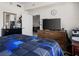 Comfortable bedroom with a dresser and a view to the living room at 200 W Sahara Ave # 1703, Las Vegas, NV 89102