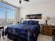 Serene bedroom offering floor-to-ceiling window views of the city skyline at 200 W Sahara Ave # 1703, Las Vegas, NV 89102