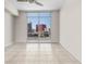Bedroom with large windows showcasing the city skyline at 200 W Sahara Ave # 1703, Las Vegas, NV 89102