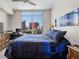 Bright bedroom featuring a large window with city views and a comfortable bed at 200 W Sahara Ave # 1703, Las Vegas, NV 89102