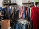 Organized closet filled with clothing and storage, and a safe at 200 W Sahara Ave # 1703, Las Vegas, NV 89102