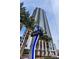 Exterior view of the Allure Las Vegas high rise condominium building, sign, and palm trees at 200 W Sahara Ave # 1703, Las Vegas, NV 89102