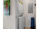 Functional laundry area with a stacked washer and dryer at 200 W Sahara Ave # 1703, Las Vegas, NV 89102