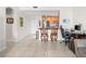 Open living area with tile flooring, a kitchen, and neutral paint at 200 W Sahara Ave # 1703, Las Vegas, NV 89102