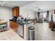 An open living area with kitchen and view to the windows at 200 W Sahara Ave # 1703, Las Vegas, NV 89102
