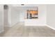 Open-concept living space with tile flooring leading to kitchen area at 200 W Sahara Ave # 1703, Las Vegas, NV 89102