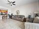 Inviting living room featuring neutral tones, tile flooring, and an open layout to the kitchen at 200 W Sahara Ave # 1703, Las Vegas, NV 89102