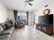 Spacious living room with tile floors and city views at 200 W Sahara Ave # 1703, Las Vegas, NV 89102
