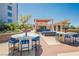 Community outdoor lounge featuring seating and a covered bar area, ideal for gatherings at 200 W Sahara Ave # 1703, Las Vegas, NV 89102