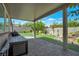 Backyard oasis featuring a covered patio, outdoor seating, and meticulously landscaped grounds at 205 Piedmont Alps St, Henderson, NV 89012