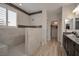 Bathroom showcasing dual shower heads, designer tiles, and a modern vanity at 205 Piedmont Alps St, Henderson, NV 89012