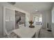 Bright dining room with an opening to the living room and sliding glass door to the patio at 205 Piedmont Alps St, Henderson, NV 89012