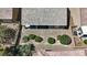 Aerial view of the property shows roof, patio, and landscaping at 2108 Willow Wren Dr, North Las Vegas, NV 89084