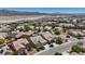 An aerial view of the residential community and desert landscape in the distance at 2108 Willow Wren Dr, North Las Vegas, NV 89084