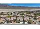 Aerial view of roof with desert landscaping in backyard at 2108 Willow Wren Dr, North Las Vegas, NV 89084