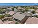 Aerial view of home showcasing the patio, roof, landscaping, and proximity to the golf course at 2108 Willow Wren Dr, North Las Vegas, NV 89084