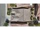 A top-down aerial view of roof, desert landscaping, and nearby homes at 2108 Willow Wren Dr, North Las Vegas, NV 89084
