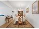 Traditional dining room with elegant table, chairs, and chandelier at 2108 Willow Wren Dr, North Las Vegas, NV 89084