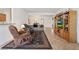 Cozy living room with comfortable seating and an entertainment center at 2108 Willow Wren Dr, North Las Vegas, NV 89084