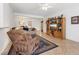 Cozy living room with comfortable seating and an entertainment center at 2108 Willow Wren Dr, North Las Vegas, NV 89084