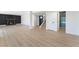 Spacious basement with modern flooring, fireplace, stairs, and an open concept design at 2180 Palora Ave, Las Vegas, NV 89169