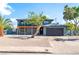 Two-story home featuring a balcony, desert landscaping, and attached two-car garage at 2180 Palora Ave, Las Vegas, NV 89169