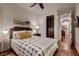 Cozy bedroom with a comfortable bed, stylish decor, and easy access to a closet at 2435 Granada Bluff Ct, Las Vegas, NV 89135