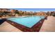 Large community swimming pool with ample lounge chairs and well-maintained surroundings for residents to enjoy at 2435 Granada Bluff Ct, Las Vegas, NV 89135