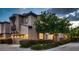 Lovely two-story home with a two-car garage, attractive landscaping, and a welcoming entrance at 2435 Granada Bluff Ct, Las Vegas, NV 89135