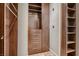 Beautifully designed walk-in closet with ample storage solutions, including drawers and shelves at 2435 Granada Bluff Ct, Las Vegas, NV 89135