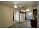 Well-lit kitchen with ceiling fan, stainless steel sink, and light countertops at 2606 S Durango Dr # 263, Las Vegas, NV 89117