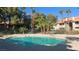 Enjoy a refreshing swim in the community pool surrounded by lush greenery at 2606 S Durango Dr # 263, Las Vegas, NV 89117