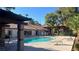 Community swimming pool with lounge chairs and well-maintained landscaping, perfect for relaxing at 2606 S Durango Dr # 263, Las Vegas, NV 89117